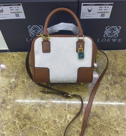 Loewe 
95 dhs✅ 

with box
🎁🎁🎁

Zain235
♥️♥️♥️