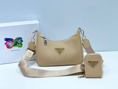 💞 Prada 2 in 1
1️⃣ First quality ＋🎁
Size : 22.5 * 18 * 6 cm
90 dhs🪙🌨️

with box🎁

Zain115
♥️♥️♥️