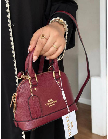 Coach
105 dhs❣️
SIZE：20cm
High-quality 

with box
🎁🎁🎁

Zain35
♥️♥️♥️