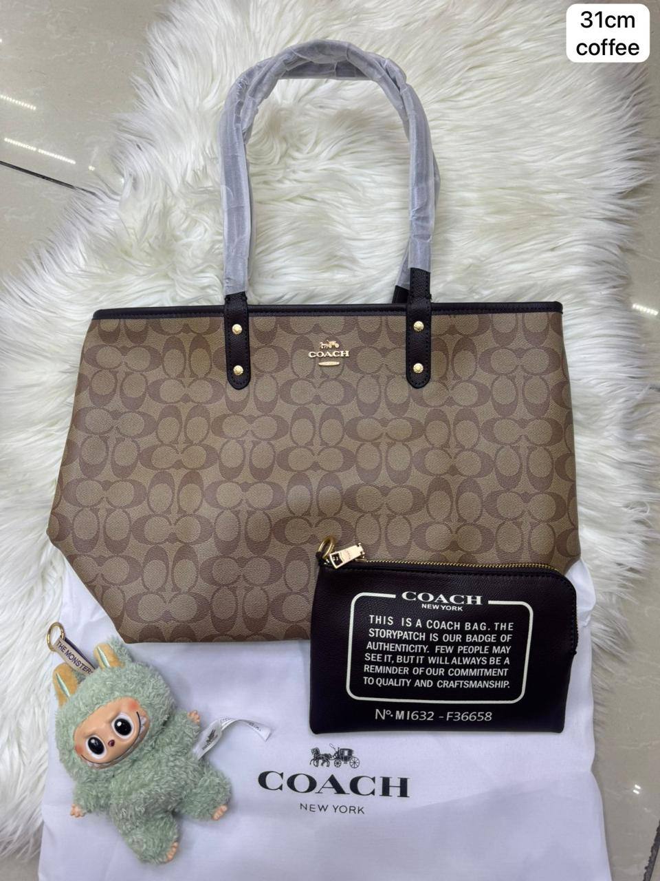 💕 Coach 2 in 1  2️⃣-sided
1️⃣ First quality
Medium Size : 31 * 28 cm
95 dhs✅

Zain115
♥️♥️♥️