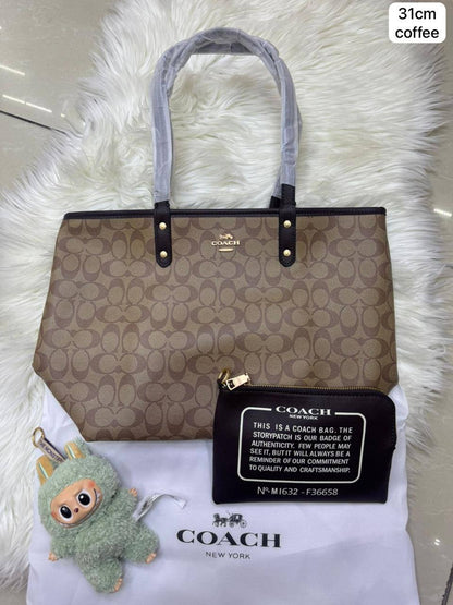 💕 Coach 2 in 1  2️⃣-sided
1️⃣ First quality
Medium Size : 31 * 28 cm
95 dhs✅

Zain115
♥️♥️♥️