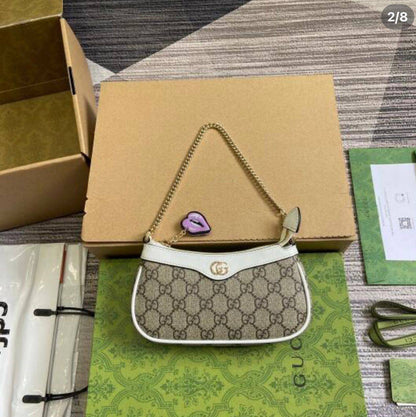 Gucci mini bag, 
good quality, 
comes with box, 🎁🎁🎁
size... 19* 11cm 
85 dhs✅

Zain12
♥️♥️♥️