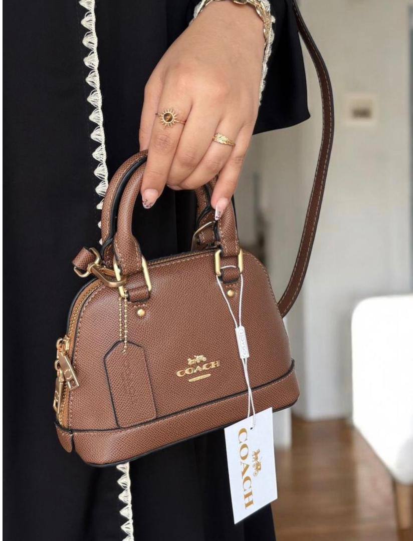 Coach
105 dhs❣️
SIZE：20cm
High-quality 

with box
🎁🎁🎁

Zain35
♥️♥️♥️