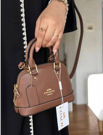 Coach
105 dhs❣️
SIZE：20cm
High-quality 

with box
🎁🎁🎁

Zain35
♥️♥️♥️