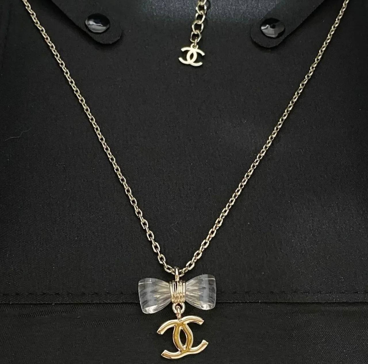 CHANEL 🤍
↗️ *Super Master Quality ®️*
* *New Collection* 
 Chanel the Ribbon 🎀 model Necklace & Earings
Necklace 
105 dhs🪙💕
Earings 
85 dhs🪙💕
Necklace with earings 
*170 dhs🪙💕* with *Normal* Box
*230 dhs🪙💕* with *Orignal* Box

Zain106
♥️♥️♥️