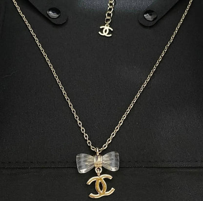 CHANEL 🤍
↗️ *Super Master Quality ®️*
* *New Collection* 
 Chanel the Ribbon 🎀 model Necklace & Earings
Necklace 
105 dhs🪙💕
Earings 
85 dhs🪙💕
Necklace with earings 
*170 dhs🪙💕* with *Normal* Box
*230 dhs🪙💕* with *Orignal* Box

Zain106
♥️♥️♥️