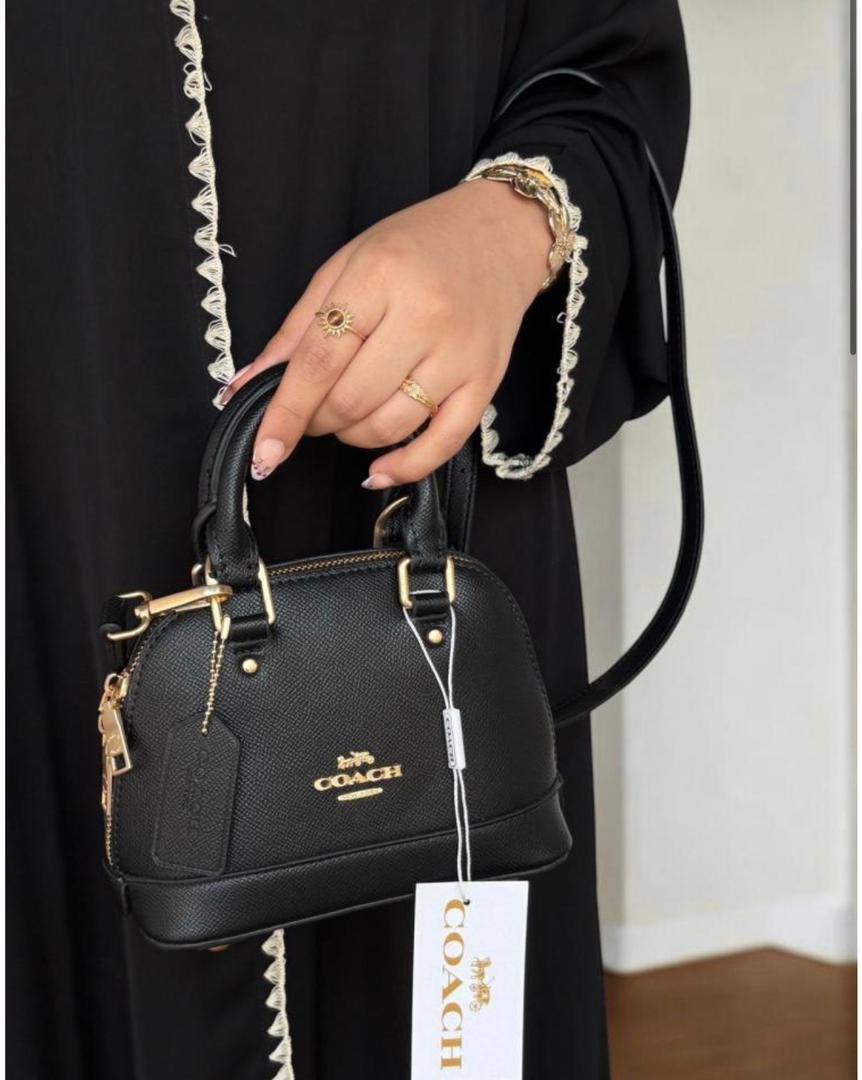 Coach
105 dhs❣️
SIZE：20cm
High-quality 

with box
🎁🎁🎁

Zain35
♥️♥️♥️