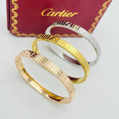Newl arrival hot moving 
🔥🔥🔥 Cartier stainless steel 18k gold plated Bangle 🔥🔥🔥 
35 dhs🪙🌨️
45 dhs🪙🌨️
with Cartier box and paper bag 
Only size 17 available!!!

Zain243
♥️♥️♥️