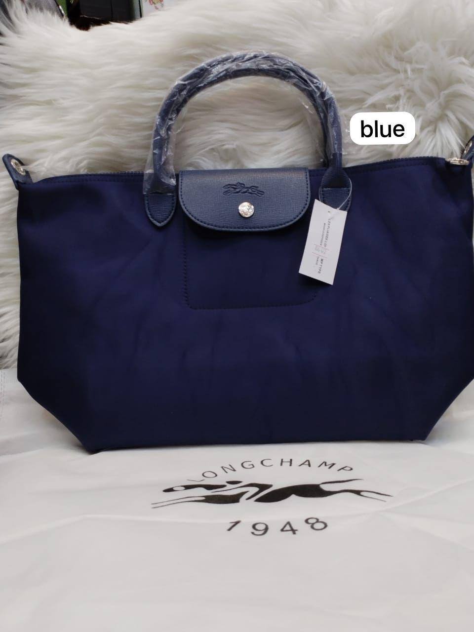 LongChamp 
Hight Quality 
Size: 44*28cm
75 dhs✅

Zain115
♥️♥️♥️