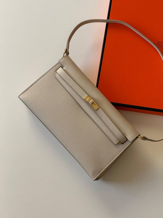 Hermes pochette epsom 
27cm💕master quality😍

with box
🎁🎁🎁

340 dhs🪙💕

Zain52
♥️♥️♥️
