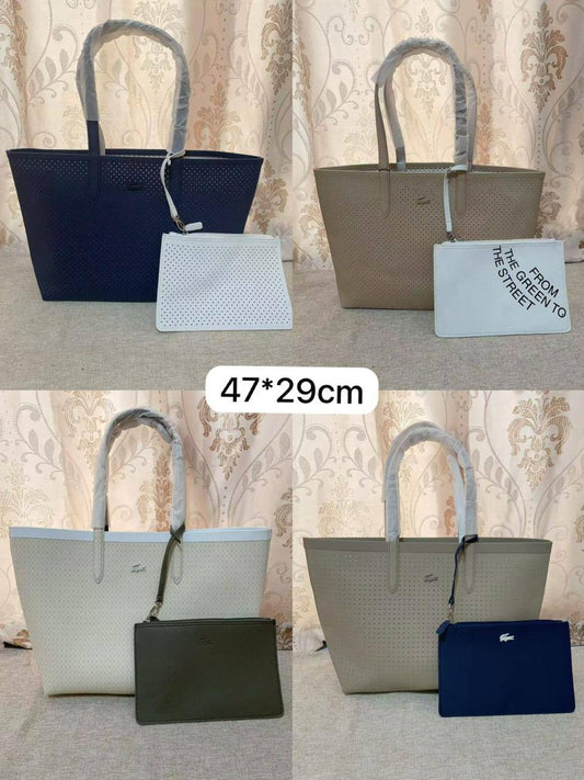 🌟 LACOSTE 🐊 New 2 in 1
Double-sided usable bag
Size: 47 * 29 cm
95 dhs🪙🖤

Zain115
♥️♥️♥️