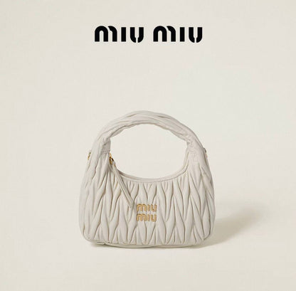 Miu Miu
95 dhs✅
size：20cm
High-quality 

with box
🎁🎁🎁

Zain35
♥️♥️♥️