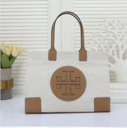 Tory  Burch
SIZE  ………42CM 🥰
95 dhs🪙🌨️

Zain244
♥️♥️♥️