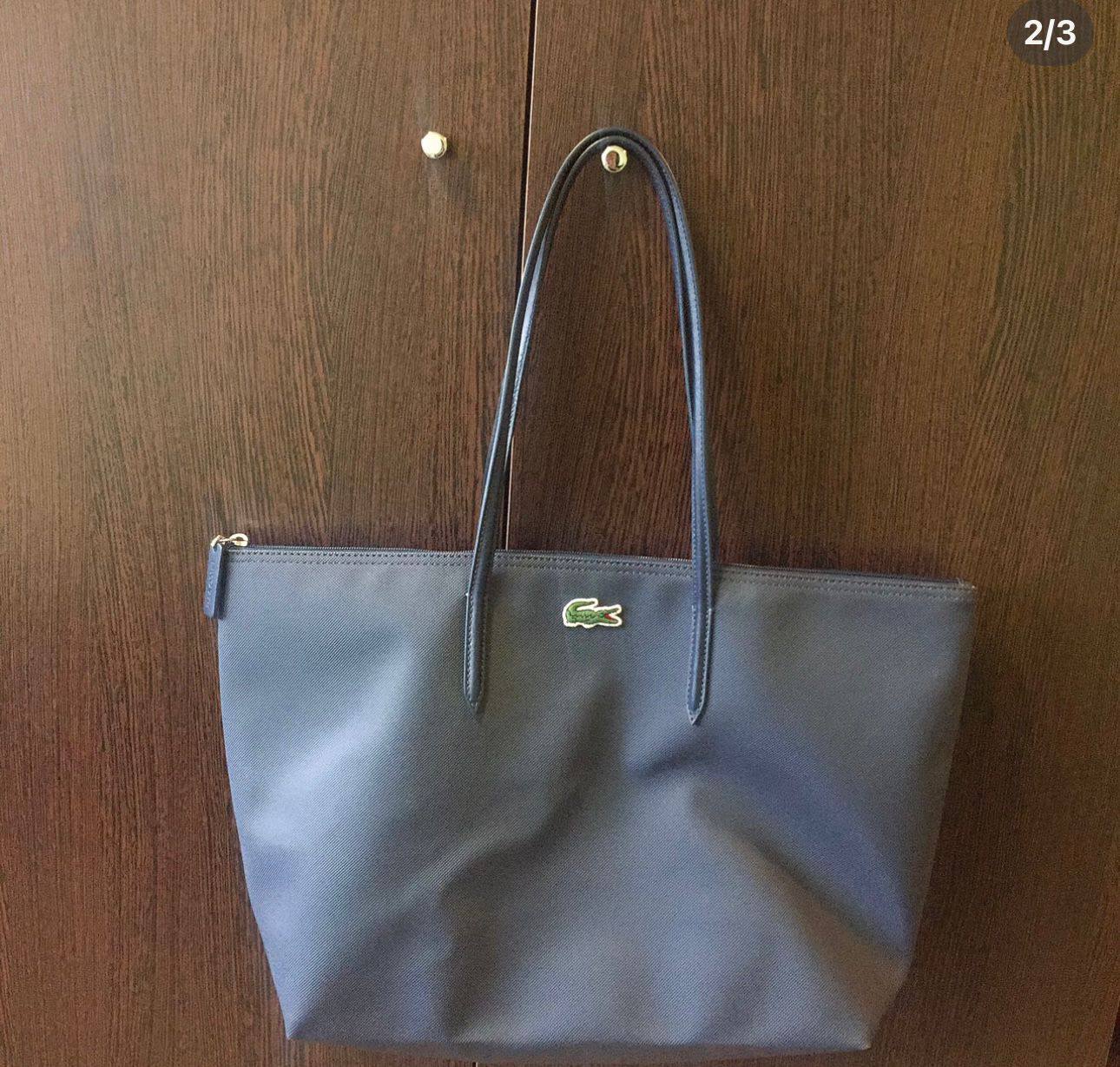 Lacoste
size 45 cm 
55 dhs❣️

Zain12
♥️♥️♥️