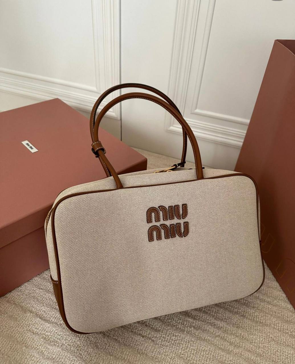 Miu Miu
good quality, 
size 34 *23 cm 
95 dhs✅

Zain12
♥️♥️♥️