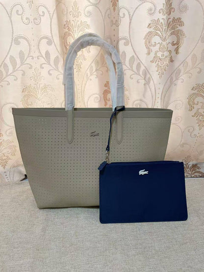 🌟 LACOSTE 🐊 New 2 in 1
✌🏻Double-sided usable bag
1⃣️First quality 
Size: 47 * 29 cm
90 dhs❤️

Zain115
♥️♥️♥️