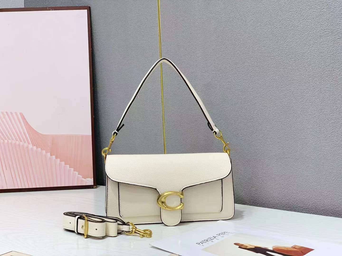 COACH Tabby 25
Gold Hardware
With 2 sizes strap
Gamosa inside
In signature canvass
Size : 25 cm
With BOX

110 dhs✅

Zain239
♥️♥️♥️