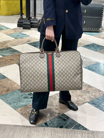 GUCCI 
TRAVELLING BAG 
 GOOD QUALITY 
120 dhs✅

Zain39
♥️♥️♥️