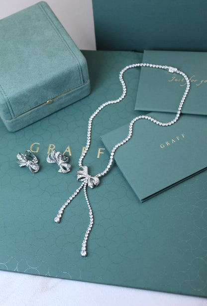 GRAFF
↗️ *Super Master Quality ®️*
Tilda’s Bow Double Strand Round Diamond Necklace with Earings

*260 dhs🇦🇪🇦🇪* with *Good* Box & bag

Zain209
♥️♥️♥️