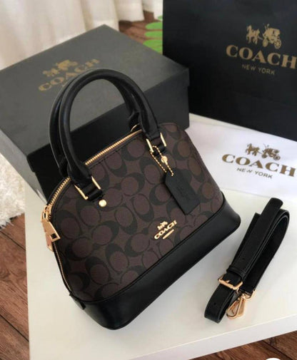 Coach
105 dhs❣️
SIZE：20cm
High-quality 

with box
🎁🎁🎁

Zain35
♥️♥️♥️