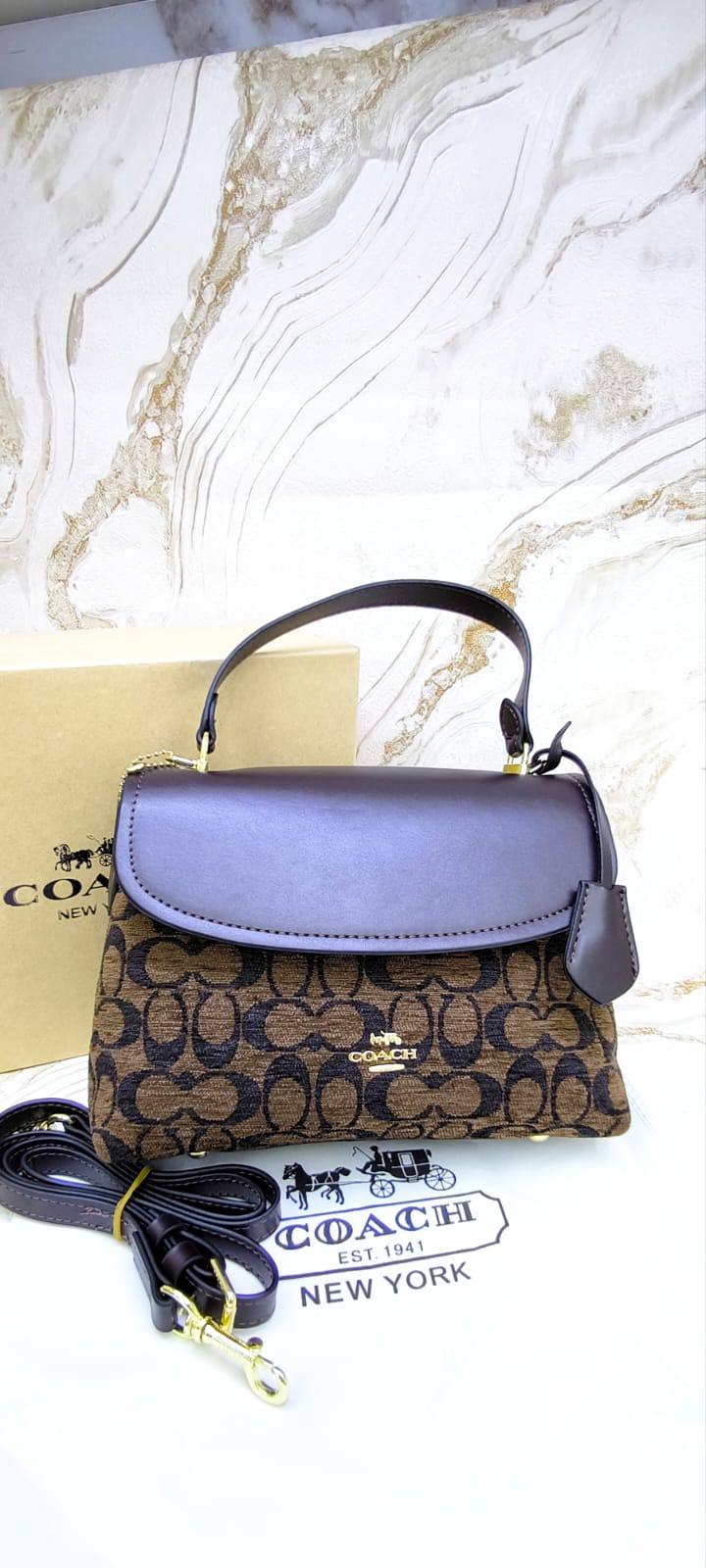 Coach
100 dhs🇦🇪🇦🇪
with box

Zain203
♥️♥️♥️